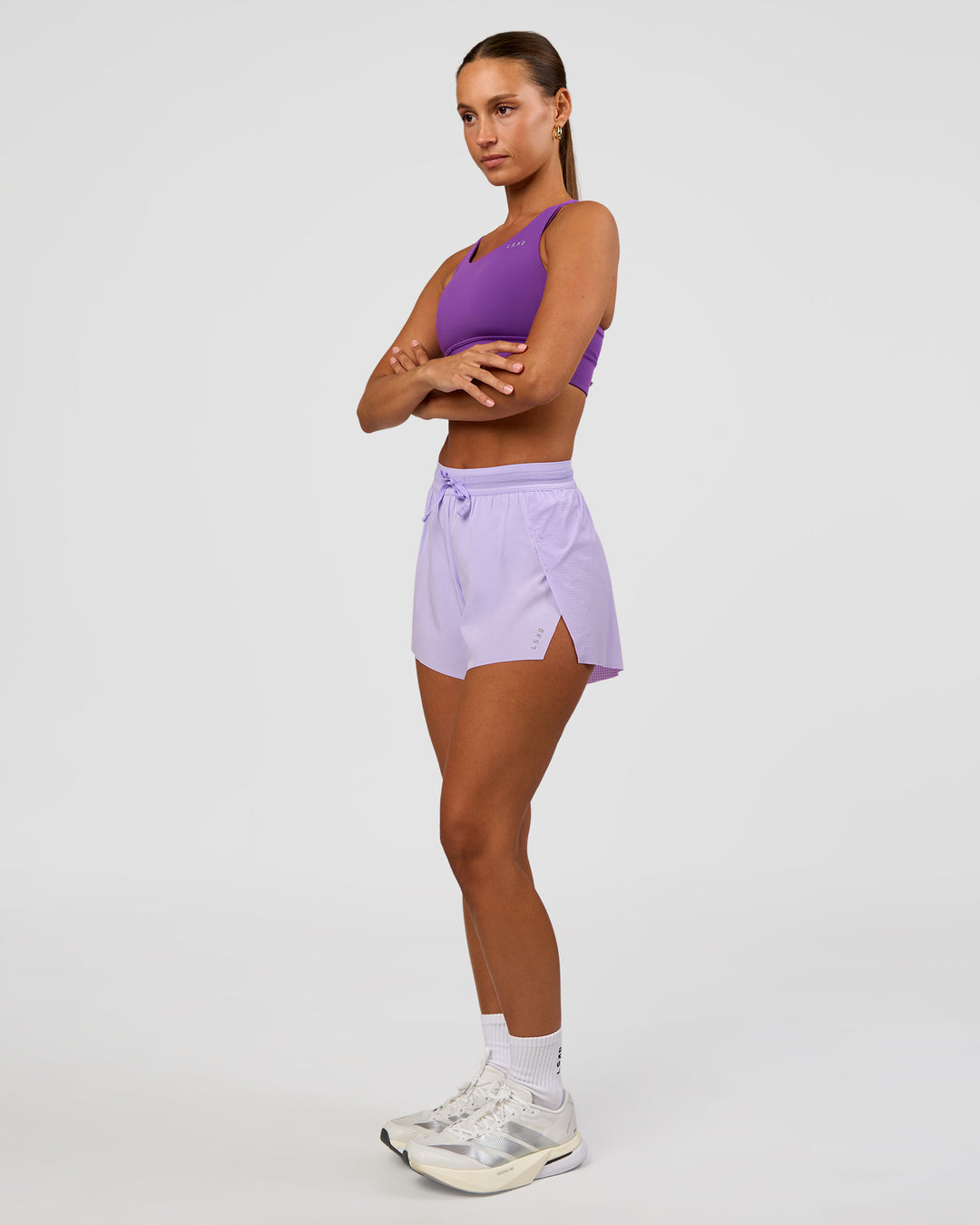 Woman wearing Accelerate 3" High-Rise Running Short - Pale Lilac | Model:Brylee | Size:XS - view 3
