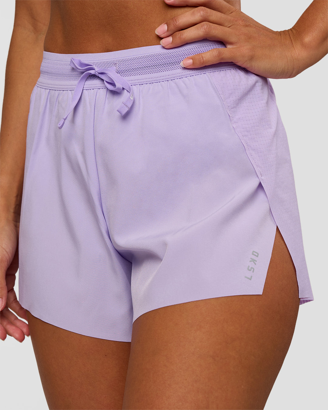 Woman wearing Accelerate 3" High-Rise Running Short - Pale Lilac | Set:true | Angle:closeup | Model:Brylee | Size:XS - view 2