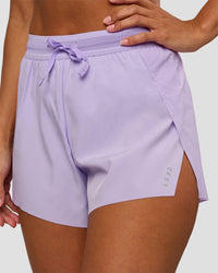 Woman wearing Accelerate 3" High-Rise Running Short - Pale Lilac | Set:true | Angle:closeup | Model:Brylee | Size:XS | Thumbnail Index: 1