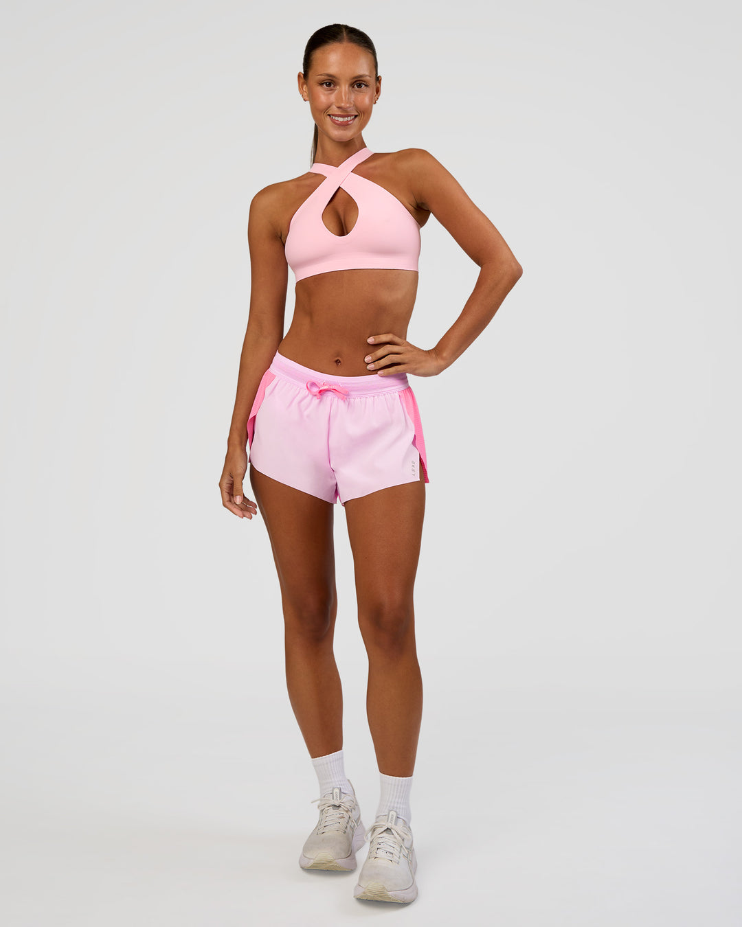 Woman wearing Accelerate 3" Mid-Rise Running Short - Candy Pink-Marshmallow | Model:Brylee | Size:XS - view 5
