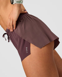 Woman wearing Accelerate 3" Mid-Rise Running Short - Cocoa Powder | Model:Maja | Size:XS | Thumbnail Index: 4