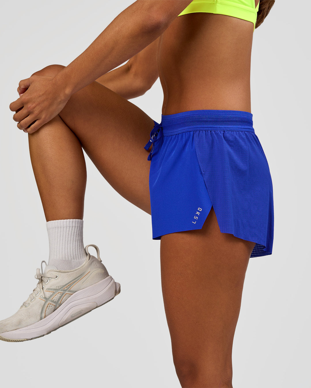 Woman wearing Accelerate 3" Mid-Rise Running Short - Electric Indigo | Model:Brylee | Size:XS - view 8