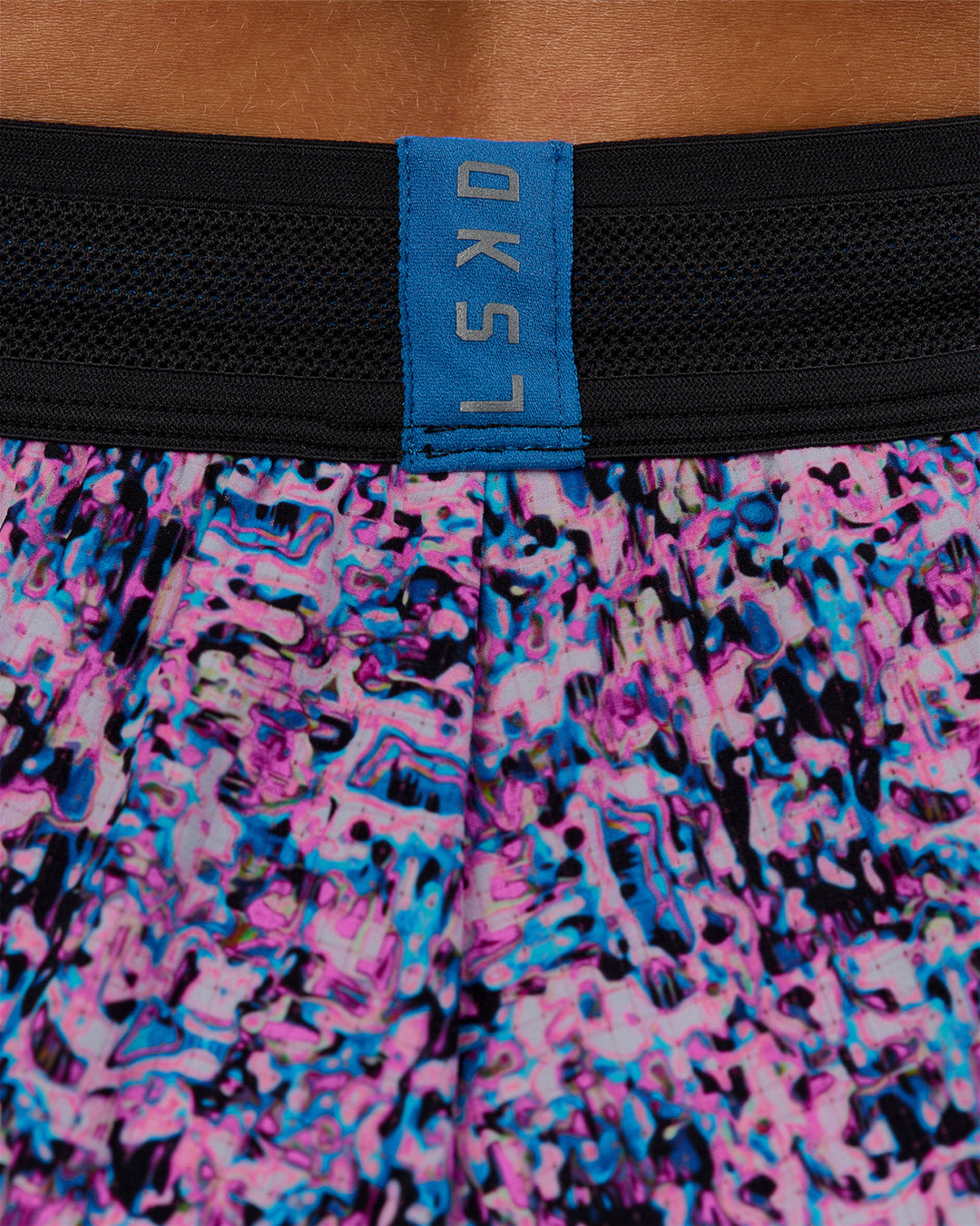Woman wearing Accelerate 3" Mid-Rise Running Short in Energy Print Blue Multi | Model:Brylee | Size:XS - view 11