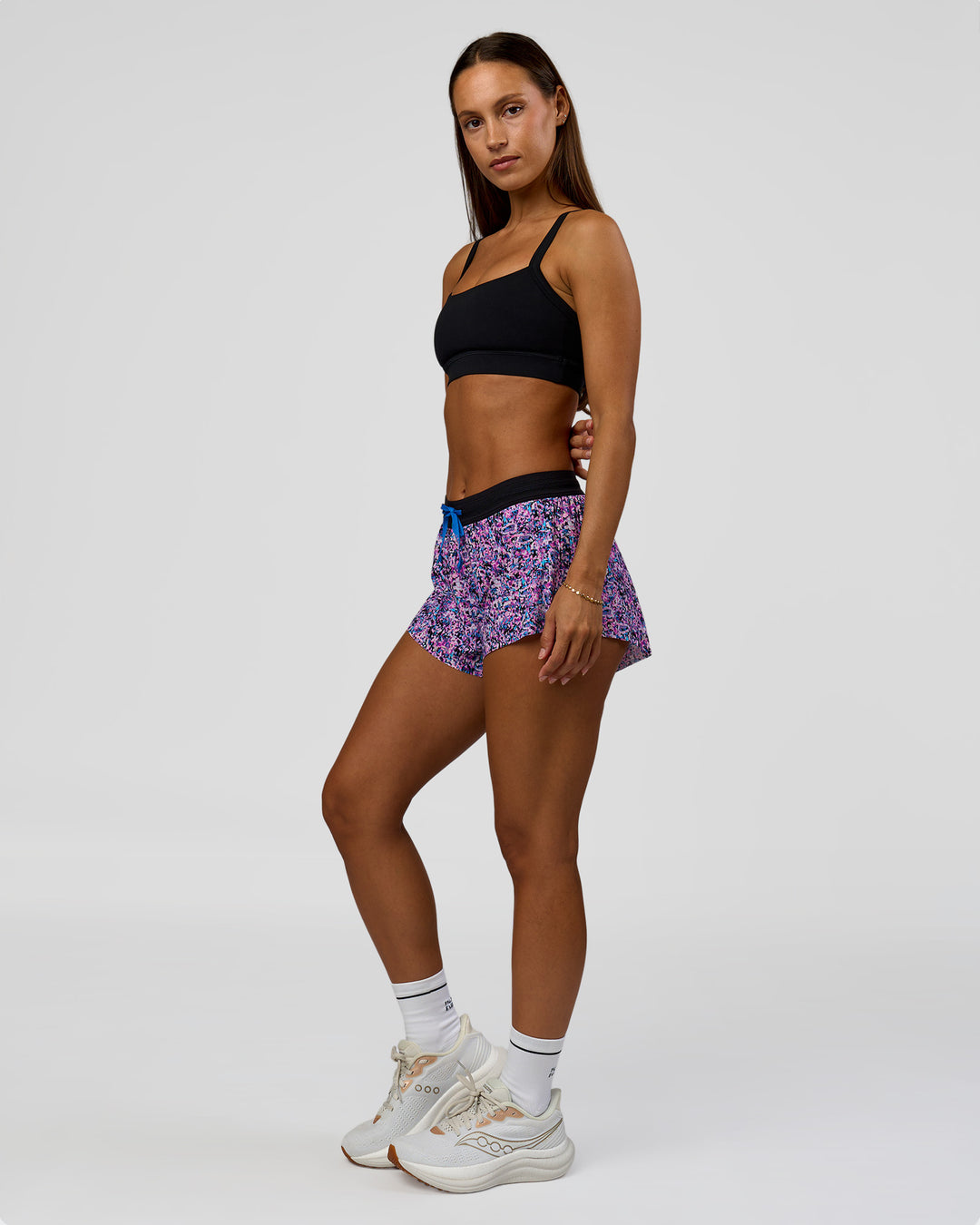 Woman wearing Accelerate 3" Mid-Rise Running Short in Energy Print Blue Multi | Model:Brylee | Size:XS - view 6