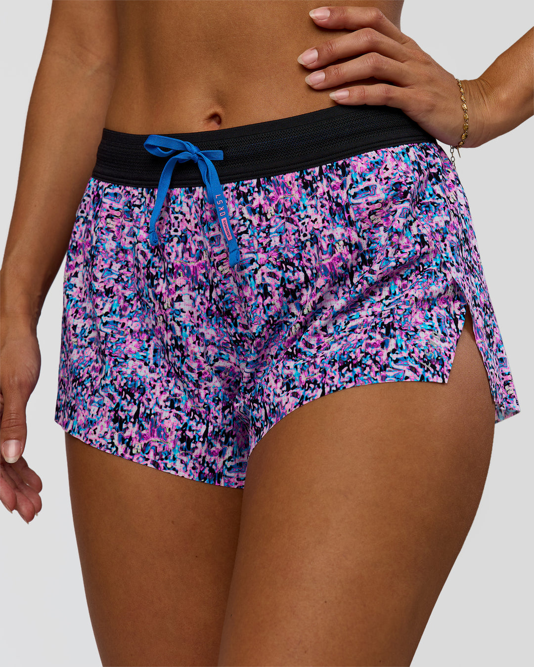 Woman wearing Accelerate 3" Mid-Rise Running Short in Energy Print Blue Multi | Model:Brylee | Size:XS - view 8