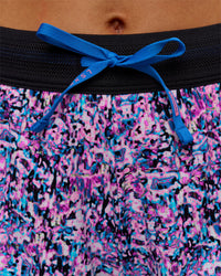 Woman wearing Accelerate 3" Mid-Rise Running Short in Energy Print Blue Multi | Model:Brylee | Size:XS | Thumbnail Index: 2