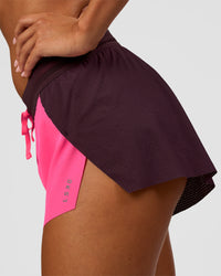Woman wearing Accelerate 3" Mid-Rise Running Short - Midnight Plum-Sugar Plum | Model:Charli | Size:XS | Thumbnail Index: 4