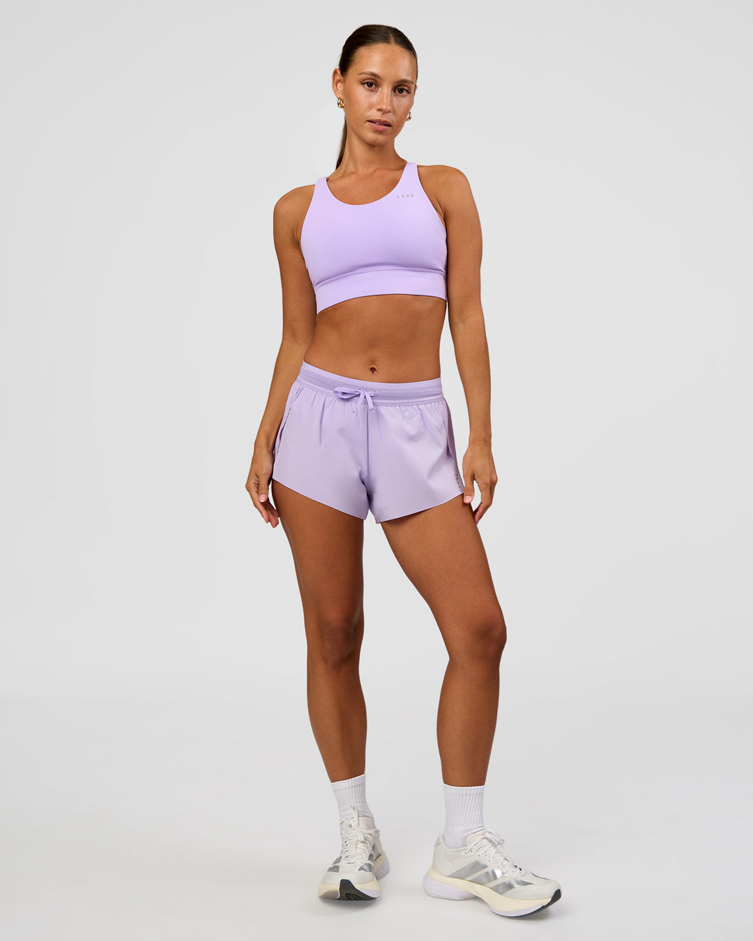 Woman wearing Accelerate 3" Mid-Rise Running Short - Pale Lilac | Model:Brylee | Size:XS - view 9
