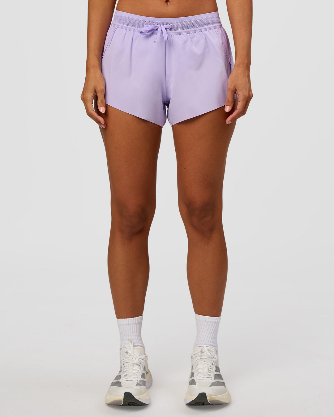 Woman wearing Accelerate 3" Mid-Rise Running Short - Pale Lilac | Set:true | Angle:front | Model:Brylee | Size:XS - view 2