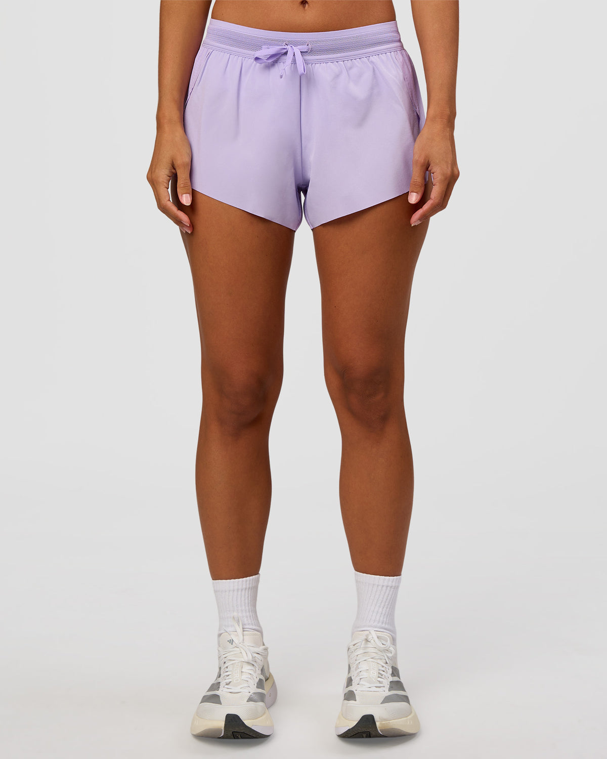 Woman wearing Accelerate 3" Mid-Rise Running Short - Pale Lilac | Set:true | Angle:front | Model:Brylee | Size:XS