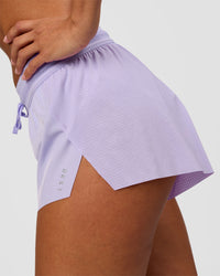 Woman wearing Accelerate 3" Mid-Rise Running Short - Pale Lilac | Model:Brylee | Size:XS | Thumbnail Index: 5