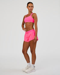Woman wearing Accelerate 3" Mid-Rise Running Short - Sugar Plum | Model:Brylee | Size:XS | Thumbnail Index: 8