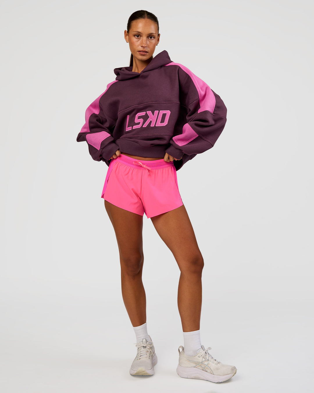 Woman wearing Accelerate 3" Mid-Rise Running Short - Sugar Plum | Model:Brylee | Size:XS - view 7