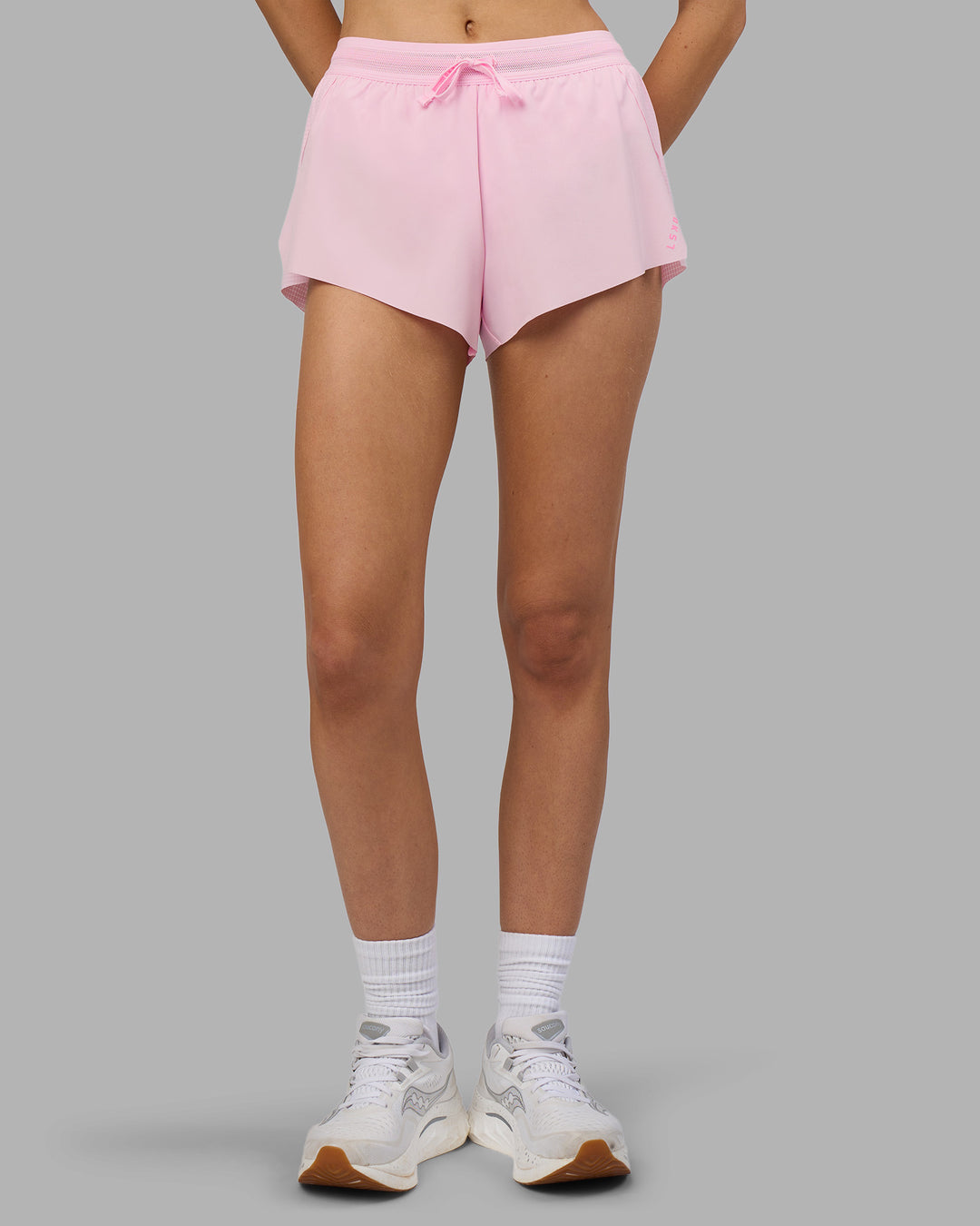 Woman wearing Accelerate 3" Running Short - Marshmallow-Candy Pink | Set:true | Angle:front | Model:Leilani | Size:XS - view 2