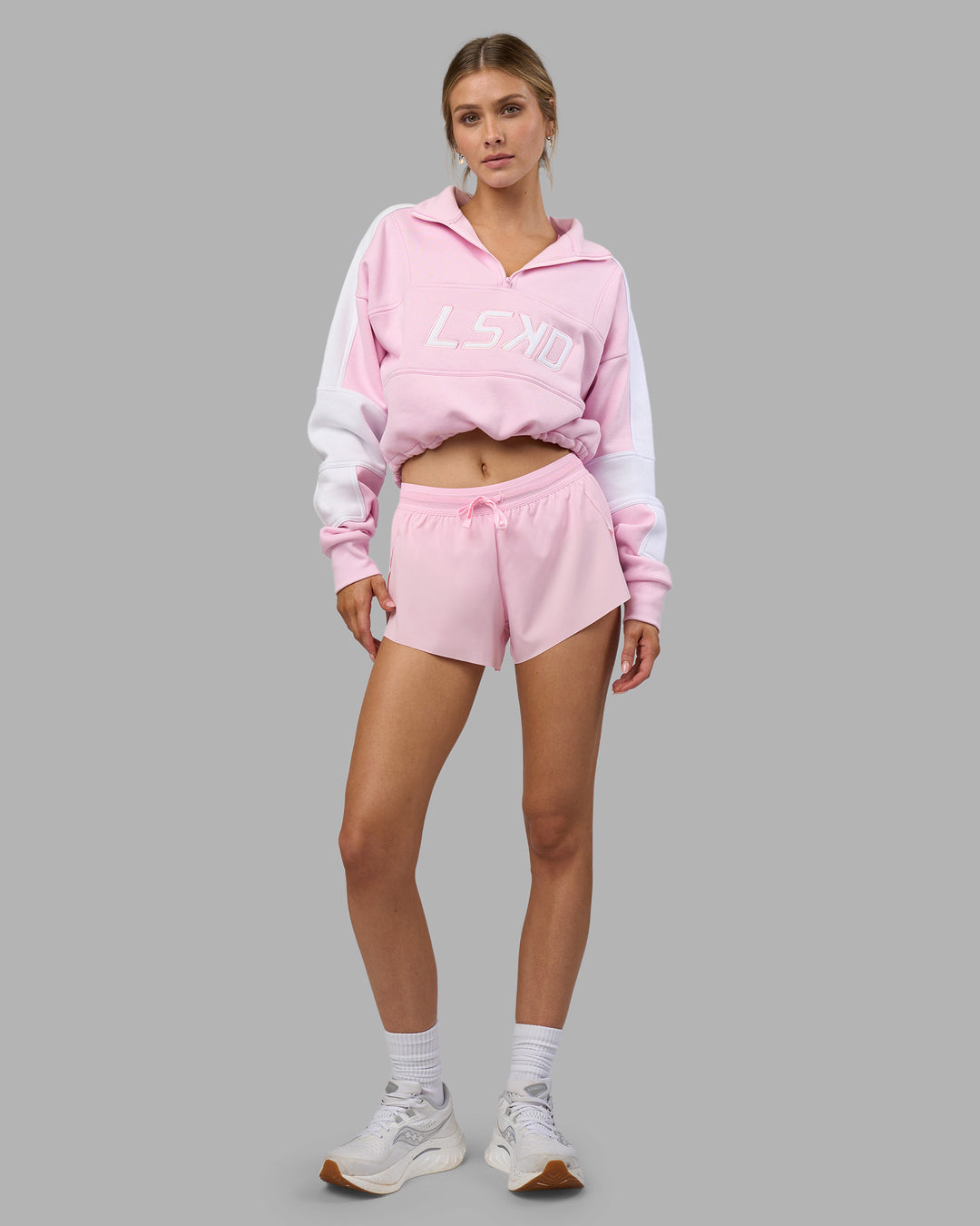 Woman wearing Accelerate 3" Running Short - Marshmallow-Candy Pink | Model:Leilani | Size:XS - view 7