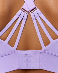 Woman wearing Accelerate Split Strap Sports Bra - Pale Lilac | Model:Brylee | Size:XS | Thumbnail Index: 4
