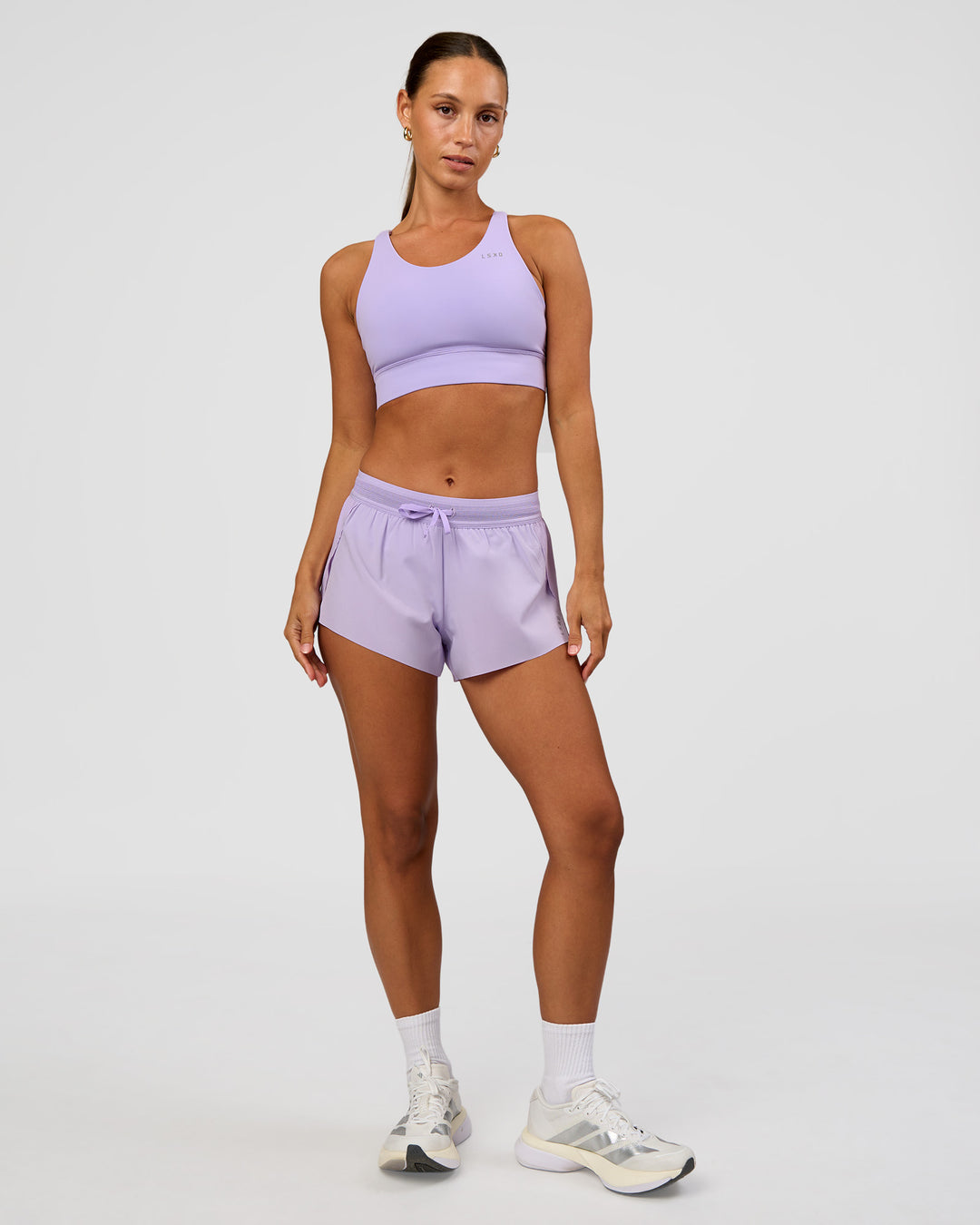 Woman wearing Accelerate Split Strap Sports Bra - Pale Lilac | Model:Brylee | Size:XS - view 3