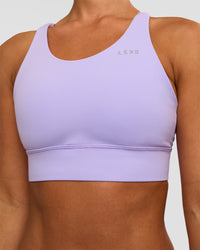 Woman wearing Accelerate Split Strap Sports Bra - Pale Lilac | Model:Brylee | Size:XS | Thumbnail Index: 5