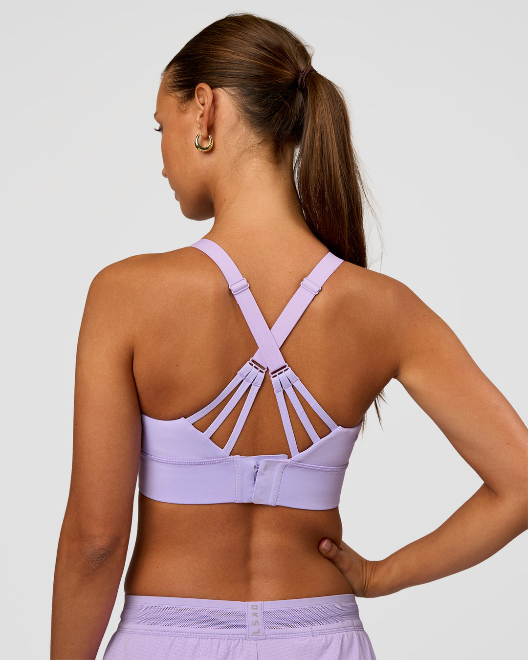 Woman wearing Accelerate Split Strap Sports Bra - Pale Lilac | Model:Brylee | Size:XS - view 8