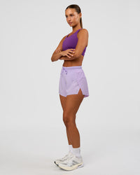 Woman wearing Accelerate Sports Bra - Fresh Purple | Model:Brylee | Size:XS | Thumbnail Index: 4