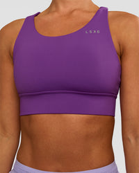 Woman wearing Accelerate Sports Bra - Fresh Purple | Set:true | Angle:closeup | Model:Brylee | Size:XS | Thumbnail Index: 3