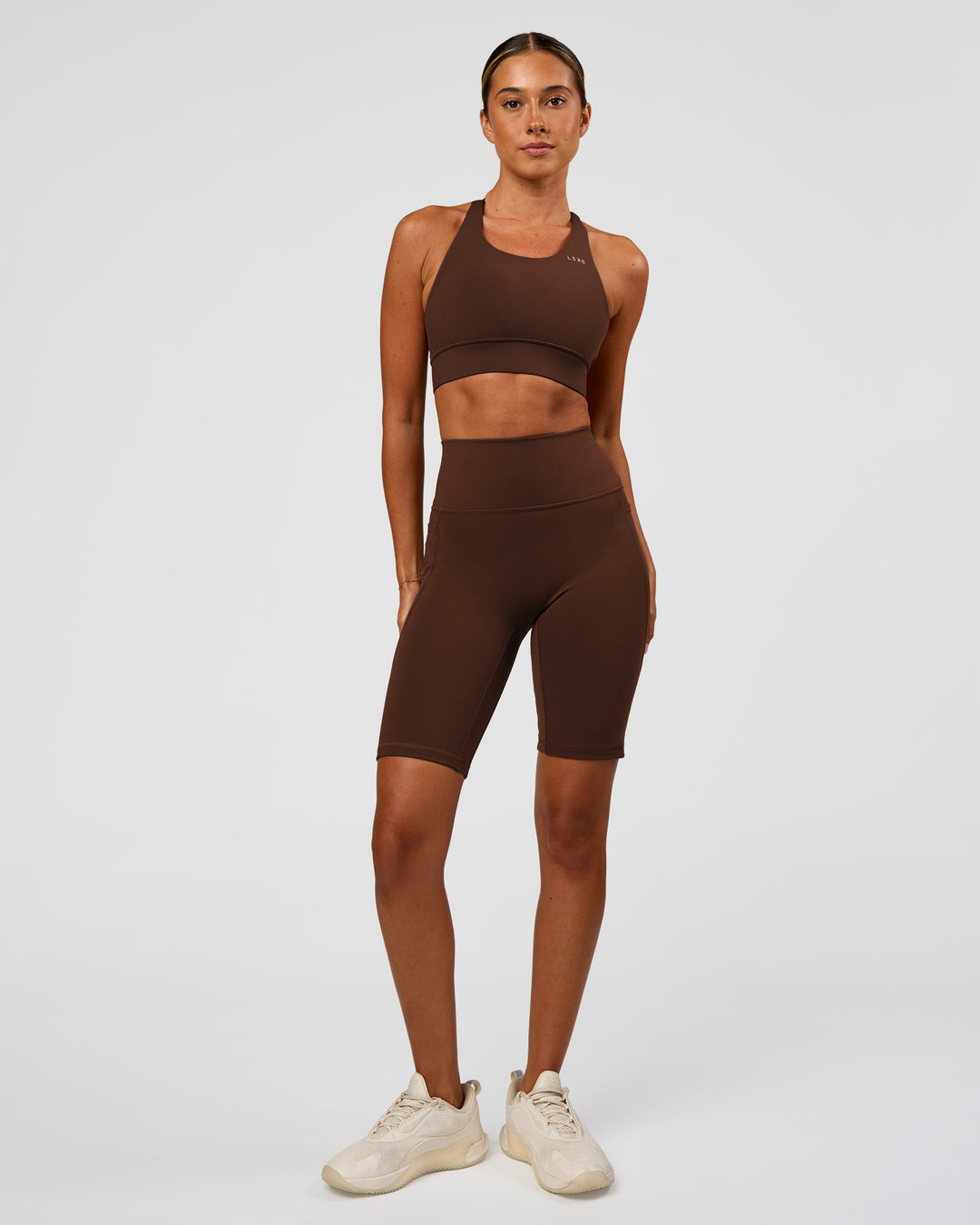 Woman wearing Accelerate Sports Bra - Hot Chocolate | Model:Charli | Size:XS - view 5
