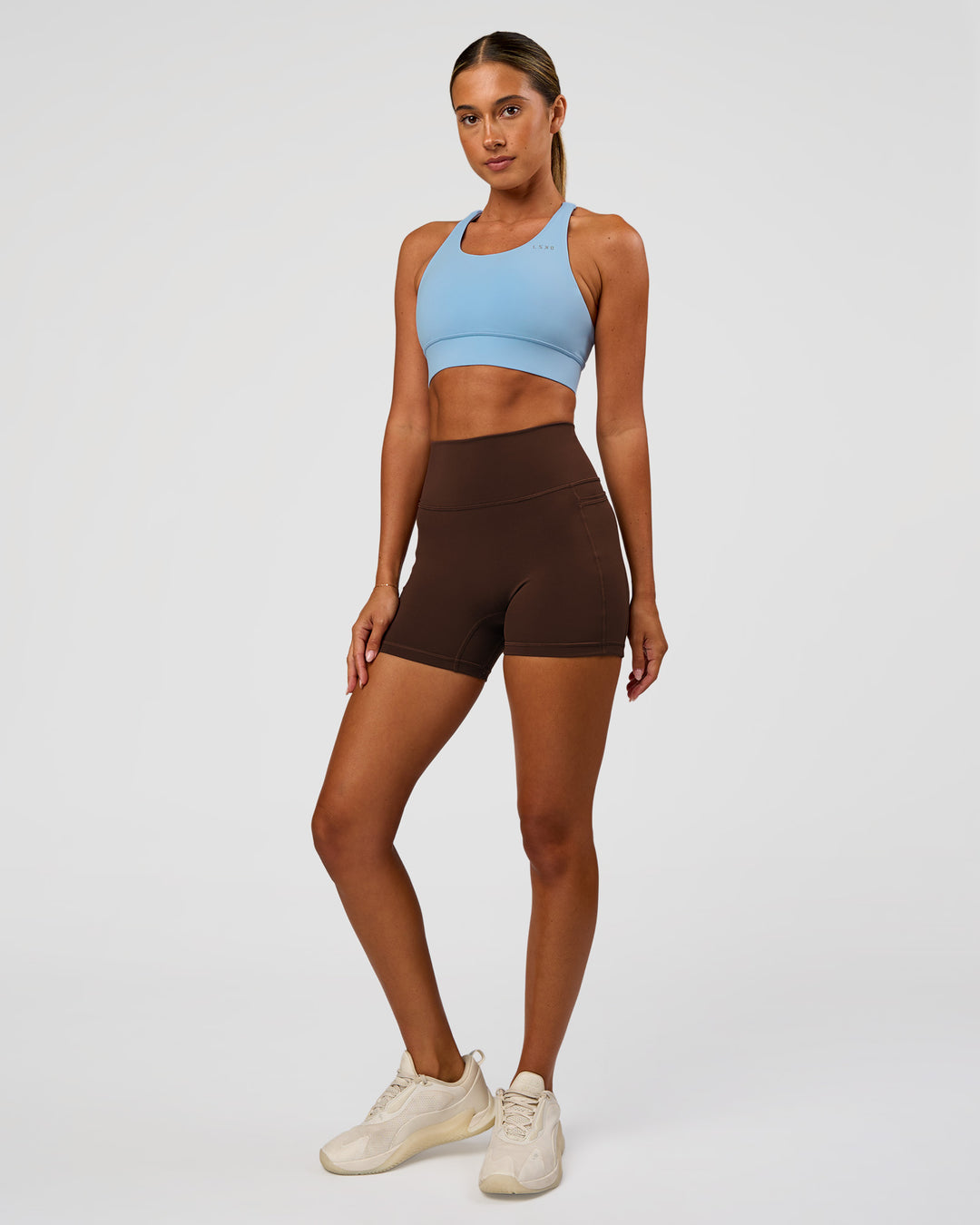 Woman wearing Accelerate Sports Bra - Open Air | Model:Charli | Size:XS - view 4
