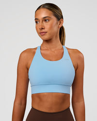 Woman wearing Accelerate Sports Bra - Open Air | Set:true | Angle:front | Model:Charli | Size:XS | Thumbnail Index: 2