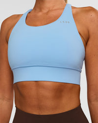 Woman wearing Accelerate Sports Bra - Open Air | Set:true | Angle:closeup | Model:Charli | Size:XS | Thumbnail Index: 4