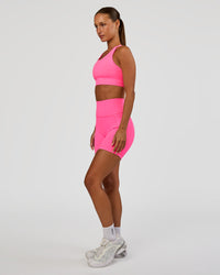 Woman wearing Accelerate Sports Bra - Sugar Plum | Model:Brylee | Size:XS | Thumbnail Index: 4