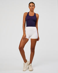 Woman wearing Activate Seamless Ribbed Shelf Bra Tank - Future Navy-Ultra Fuchsia | Model:Charli | Size:XS | Thumbnail Index: 1