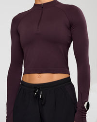 Woman wearing AeroFLX+ Long Sleeve Skimmer Half Zip - Midnight Plum/Midnight Plum | Model:Maja | Size:XS | Thumbnail Index: 6