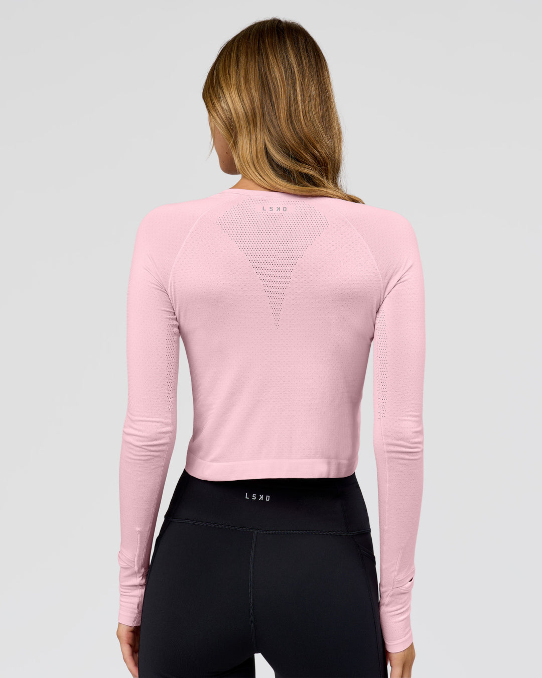Woman wearing AeroFLX+ Seamless Long Sleeve Skimmer Tee - Marshmallow/Marshmallow | Model:Leilani | Size:XS - view 4