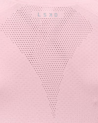 Woman wearing AeroFLX+ Seamless Long Sleeve Skimmer Tee - Marshmallow/Marshmallow | Model:Leilani | Size:XS | Thumbnail Index: 1