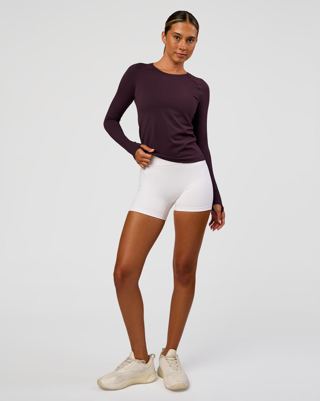 Woman wearing AeroFLX+ Seamless Long Sleeve Tee - Midnight Plum/Midnight Plum | Model:Charli | Size:XS - view 7
