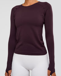 Woman wearing AeroFLX+ Seamless Long Sleeve Tee - Midnight Plum/Midnight Plum | Model:Charli | Size:XS | Thumbnail Index: 4