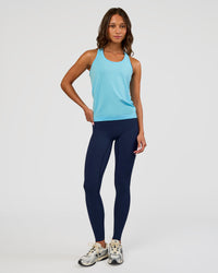 Woman wearing AeroFLX+ Seamless Tank - Baltic Sea/Baltic Sea | Model:Dakota | Size:XS | Thumbnail Index: 2