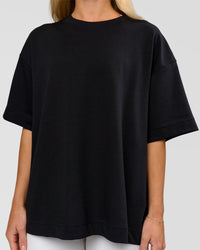 Woman wearing AfterDark ZeroCrease Boxy Tee in Black | Model:Issy | Size:XS | Thumbnail Index: 15