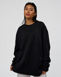 Woman wearing AfterDark ZeroCrease Long Sleeve Tee - Black | Model:Loren | Size:XS | Thumbnail Index: 4