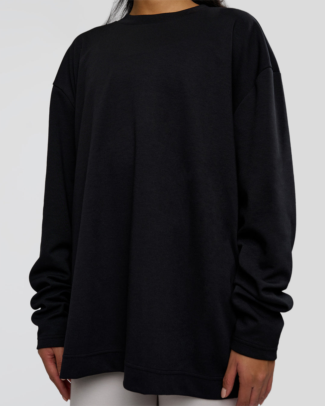Woman wearing AfterDark ZeroCrease Long Sleeve Tee - Black | Model:Loren | Size:XS - view 12