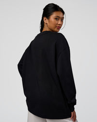 Woman wearing AfterDark ZeroCrease Long Sleeve Tee - Black | Model:Loren | Size:XS | Thumbnail Index: 7