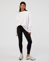 Woman wearing AfterDark ZeroCrease Long Sleeve Tee - White | Model:Loren | Size:XS | Thumbnail Index: 4
