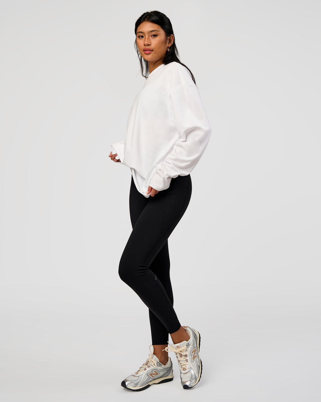 Woman wearing AfterDark ZeroCrease Long Sleeve Tee - White | Model:Loren | Size:XS - view 9