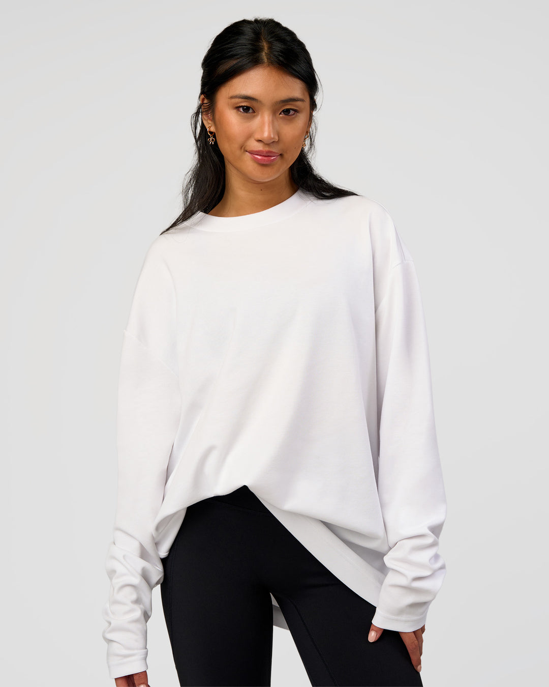 Woman wearing AfterDark ZeroCrease Long Sleeve Tee - White | Model:Loren | Size:XS - view 4