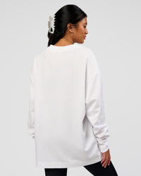 Woman wearing AfterDark ZeroCrease Long Sleeve Tee - White | Model:Loren | Size:XS | Thumbnail Index: 7