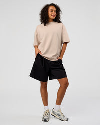 Woman wearing AfterDark ZeroCrease Oversized Tee - Shale Beige | Model:Jasmine | Size:XS | Thumbnail Index: 4