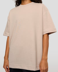 Woman wearing AfterDark ZeroCrease Oversized Tee - Shale Beige | Model:Jasmine | Size:XS | Thumbnail Index: 8