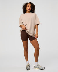 Woman wearing AfterDark ZeroCrease Oversized Tee - Shale Beige | Model:Jasmine | Size:XS | Thumbnail Index: 10