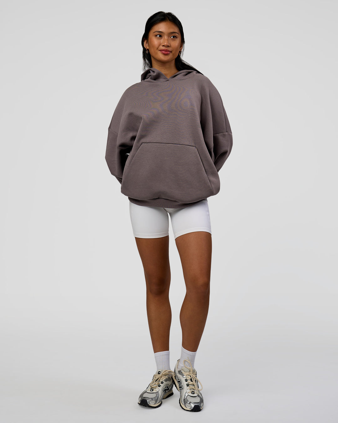 Woman wearing AfterDark ZeroCrease Oversized Hoodie - Duskstone | Model:Loren | Size:XS - view 5
