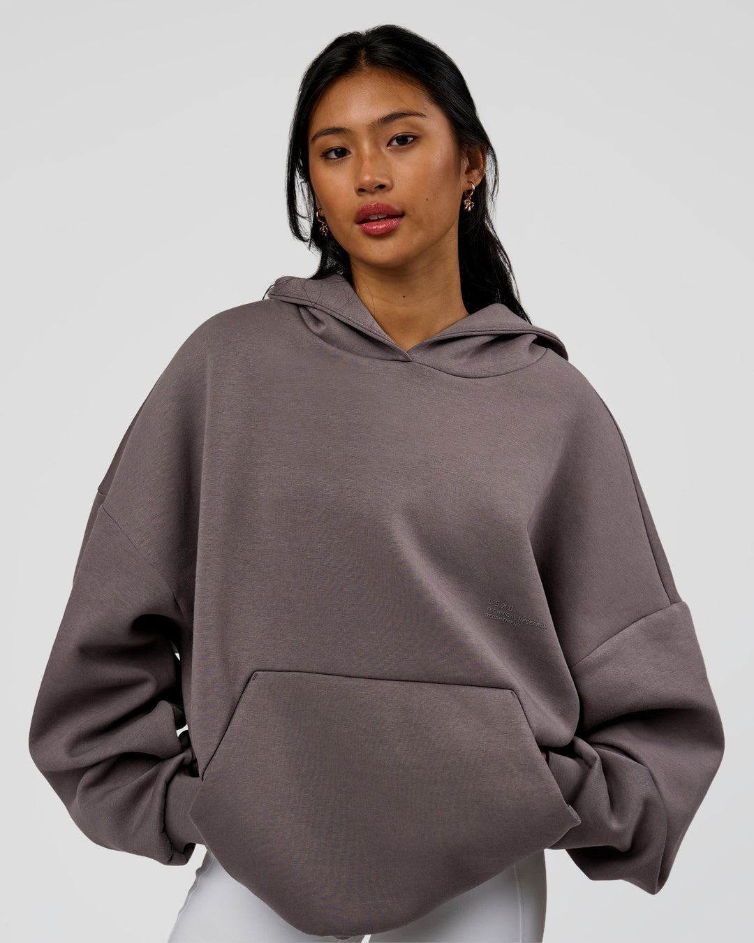 Woman wearing AfterDark ZeroCrease Oversized Hoodie - Duskstone | Model:Loren | Size:XS - view 4